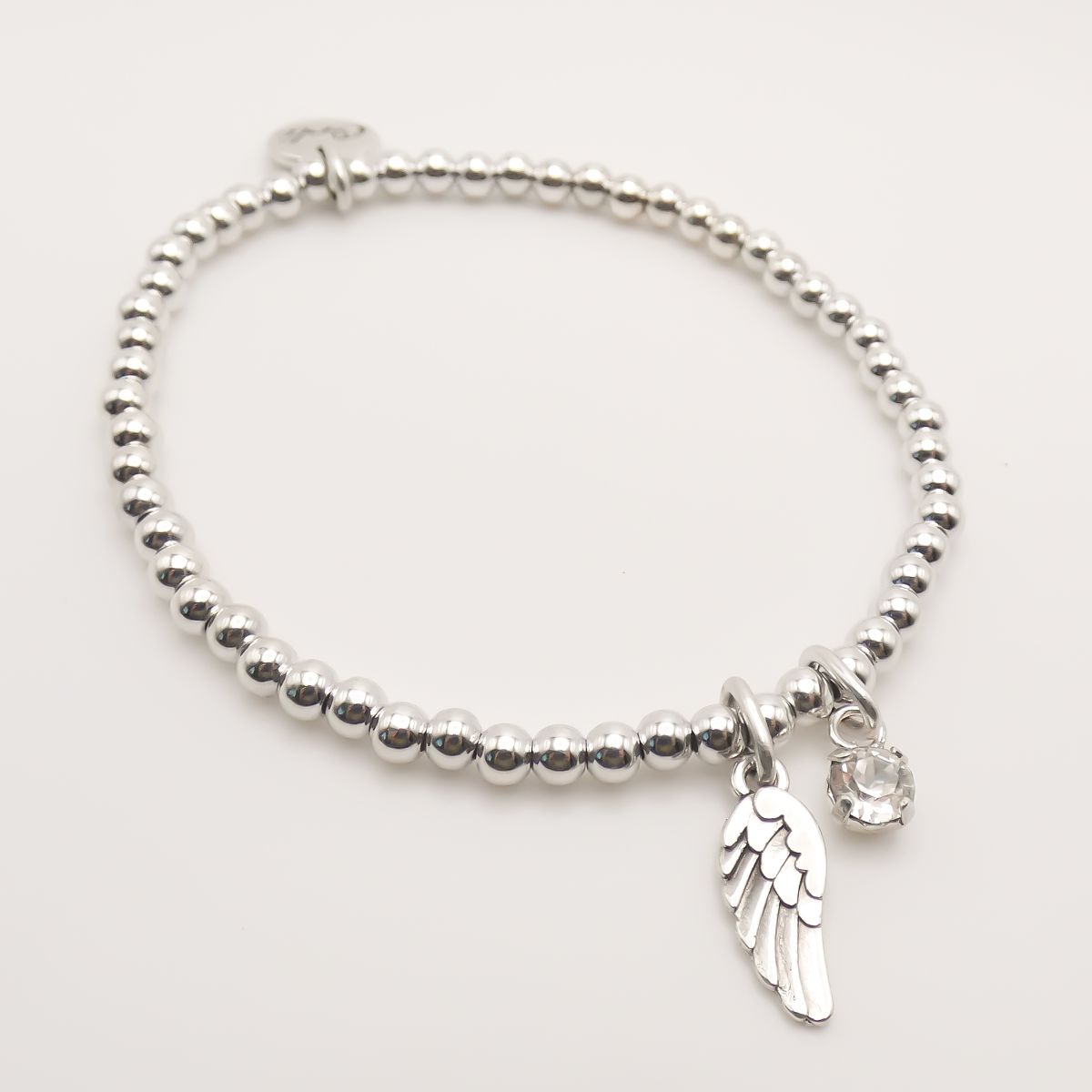 Angel Wings Charm with Blue Opalescent Beads Charity Bracelet – HELP by TJ